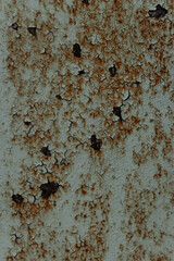 Rusty metal surface. Rough vertical background. Dirty aged pattern. Grunge cracked background. Industrial textured backdrop. Scratch template. Vintage blue and yellow corrosion banner.