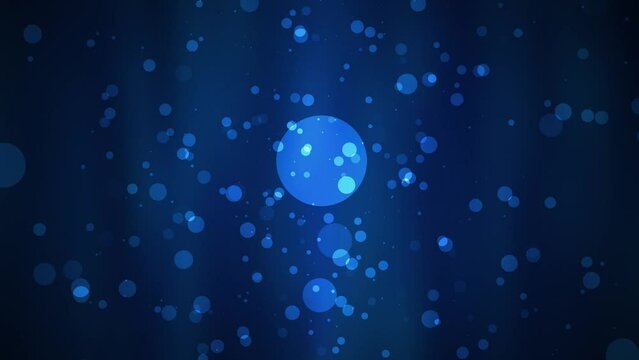blue glitter particles falling on dark background, particles falling on blue background