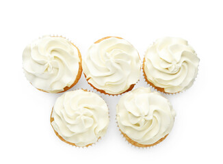 Tasty vanilla cupcakes with cream isolated on white, top view