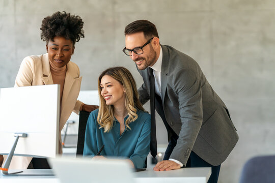 Group of diverse multiethnic business people and software developers working as a team in office