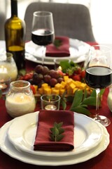 Stylish table setting with burning candles. Romantic dinner