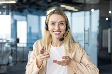 Professional woman with headset offering customer support