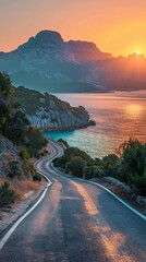 The road winding past the picturesque turquoise water at sunrise.