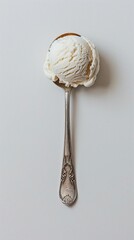 spoon with white ice cream on white background, copy space, minimalistic