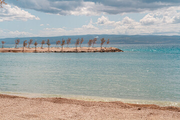 A little headland on the beach in the City of Split, Croatia | Cypelek na plaży w mieście Split,...