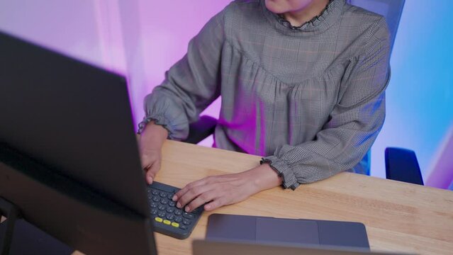 Hands typing on computer keyboard. Digital technology. Software development concept. Female programmer writes code Software engineer working on laptop with circuit board and javascript on virtual scre