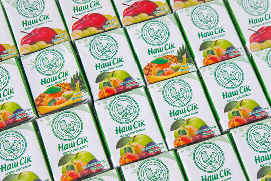 Children's juice in a tetra pack Nash Sik -Our juice. Odesa baby food factory logo. Drink in a box with a straw. Ukraine, Kyiv - January 16, 2024.