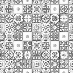Seamless variety of embossed tiles with floral and geometric patterns in grayscale. The image features a detailed and seamless design, perfect for backgrounds or textures in monochrome style - obrazy, fototapety, plakaty