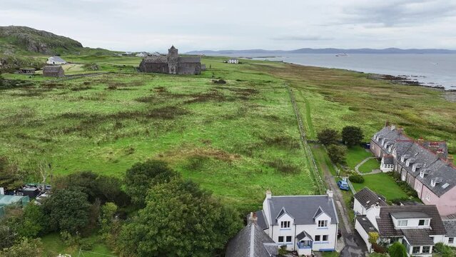 Aerial View of Iona Island Village and Abbey Nunnery Building, Homes, Landmark and Landscape, Scotland UK
