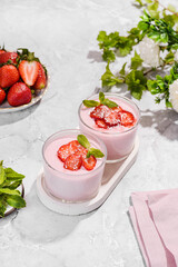 Panna cotta with strawberries and mint