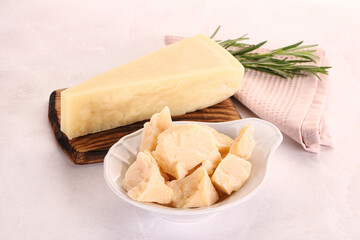 Chopped Italian hard parmesan cheese