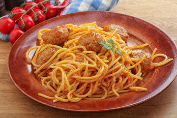 Spaghetti with meatball in tomato sause