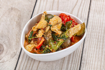 Thai red spicy curry with chicken