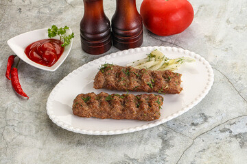 Kebab with beef served onion