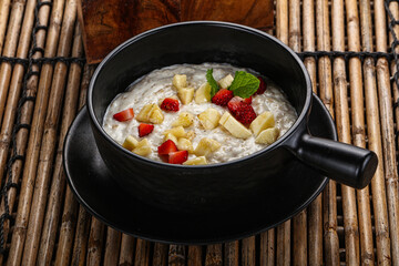 Breakfast sweet porrige with banana