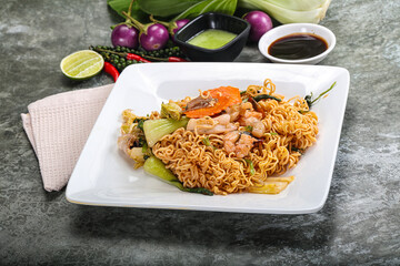 Asian cuisine - Fried noodles with seafood