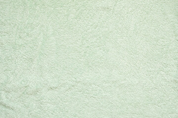 Green fluffy towel fabric soft texture background
