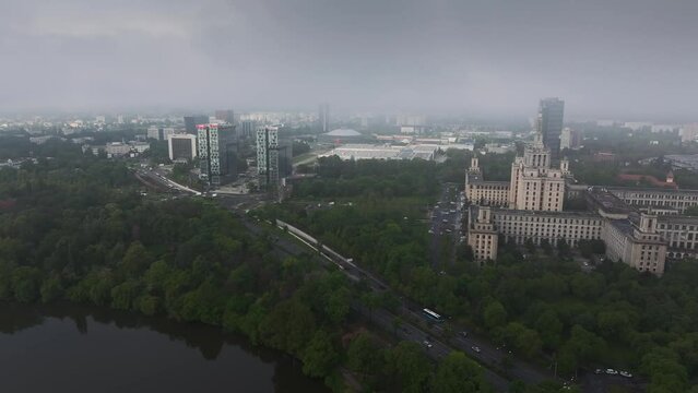 Bucharest from above. Aerial 4K video during a foggy morning in north part of Bucharest, view to Free Press House (Casa Presei Libere in Romanian) and office skyscraper buildings in Romania.
