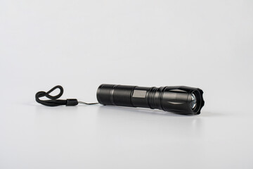 Electric LED torch flashlight isolated on a white background