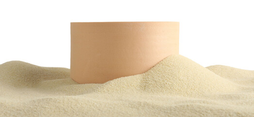 Presentation of product. Beige podium on sand against white background
