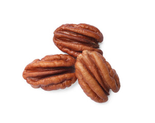 Tasty pecan nuts isolated on white, top view