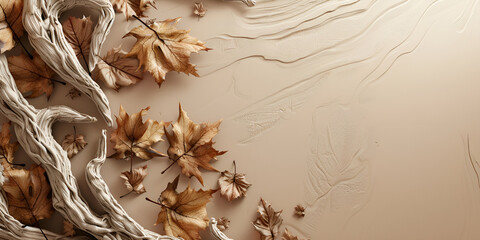 Fototapeta premium Autumn leaves scattered on a beige background, showcasing the vibrant colors of the season.
