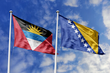  3d illustration. Antigua and Barbuda and Bosnia and Herzegovina Flag waving in sky. High detailed...