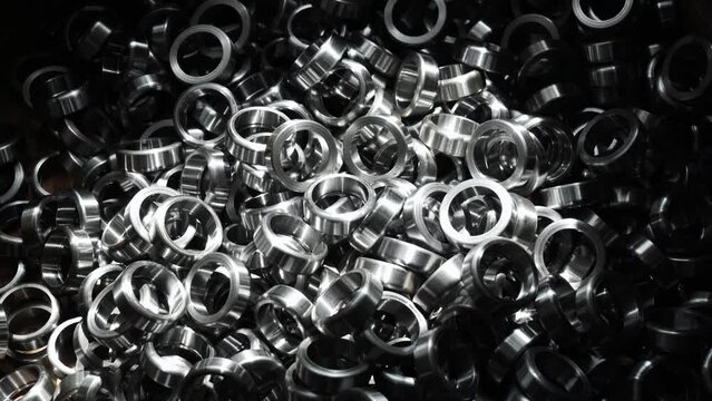 Spare parts in the form of round bearings of different sizes. Steel ball bearing. Part of mechanism