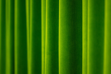 Warm golden velvet curtains abstract background