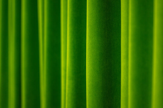 Warm golden velvet curtains abstract background