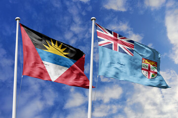  3d illustration. Antigua and Barbuda and Fiji  Flag waving in sky. High detailed waving flag. 3D...