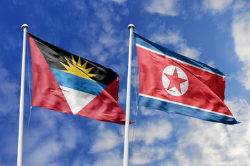  3d illustration. Antigua and Barbuda and North Korea Flag waving in sky. High detailed waving flag. 3D render. Waving in sky. Flags fluttered in the cloudy sky.