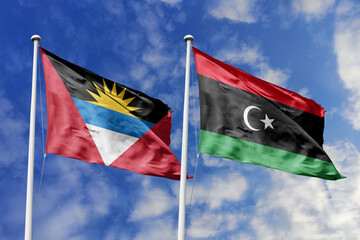  3d illustration. Antigua and Barbuda and Libya 
 Flag waving in sky. High detailed waving flag. 3D render. Waving in sky. Flags fluttered in the cloudy sky.