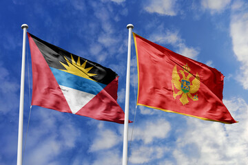 Naklejka na ściany i meble 3d illustration. Antigua and Barbuda and Montenegro Flag waving in sky. High detailed waving flag. 3D render. Waving in sky. Flags fluttered in the cloudy sky.
