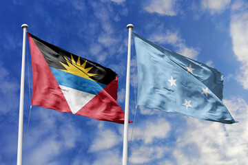 3d illustration. Antigua and Barbuda and Micronesia Flag waving in sky. High detailed waving flag....