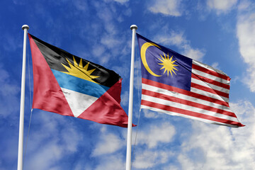 3d illustration. Antigua and Barbuda and Malaysia Flag waving in sky. High detailed waving flag. 3D render. Waving in sky. Flags fluttered in the cloudy sky.