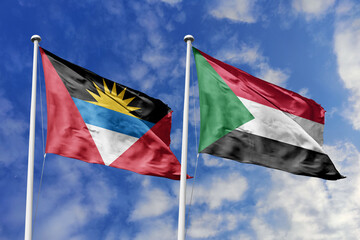 3d illustration. Antigua and Barbuda and Sudan Flag waving in sky. High detailed waving flag. 3D render. Waving in sky. Flags fluttered in the cloudy sky.