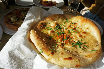 Close up cheese pizza based