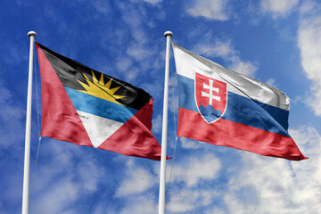 3d illustration. Antigua and Barbuda and Slovakia Flag waving in sky. High detailed waving flag. 3D render. Waving in sky. Flags fluttered in the cloudy sky.