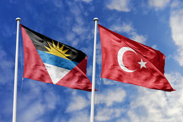 3d illustration. Antigua and Barbuda and Turkey Flag waving in sky. High detailed waving flag. 3D render. Waving in sky. Flags fluttered in the cloudy sky.
