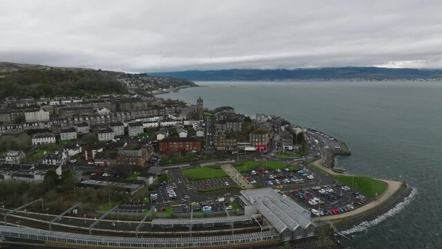 Gourock, Scotland on a windy day over the River Clyde slowly pulling back from the headland.