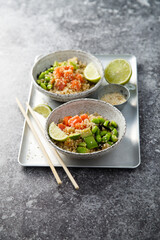 Salmon poke with quinoa and avocado