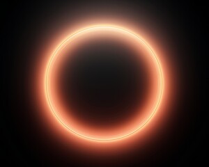 A glowing orange ring of light on a black background.