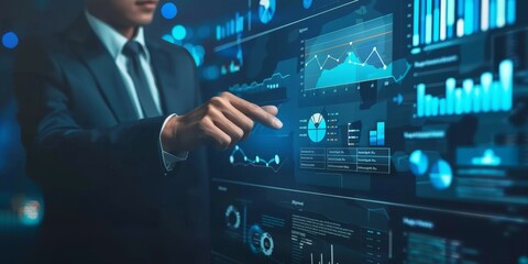 A man is pointing at a computer screen with a lot of graphs and numbers. Concept of analyzing data and making decisions based on the information presented. Scene is serious and focused