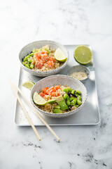 Salmon poke with quinoa and avocado