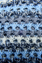 Detalle de tejido de hilo azul, blanco y negro