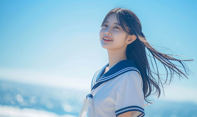 海辺にいるセーラー服の少女