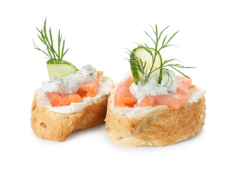 Tasty canapes with salmon, cucumber, cream cheese and dill isolated on white