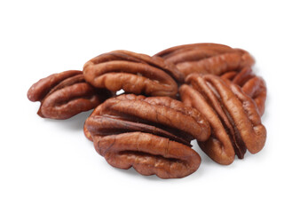 Many tasty pecan nuts isolated on white