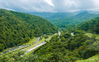 A bird's-eye view from a vantage point along Route 93 looking east over the open valley of the...